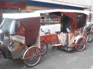 Bicycle taxis for hire in Mexico City © Peter W. Davies, 2013