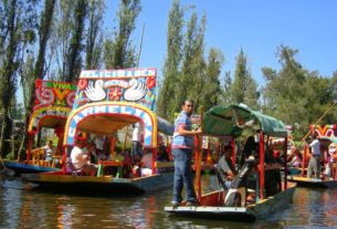 The boats at Xochimilco, Mexico, are often hired for birthday parties and family celebrations © Edythe Anstey Hanen, 2013