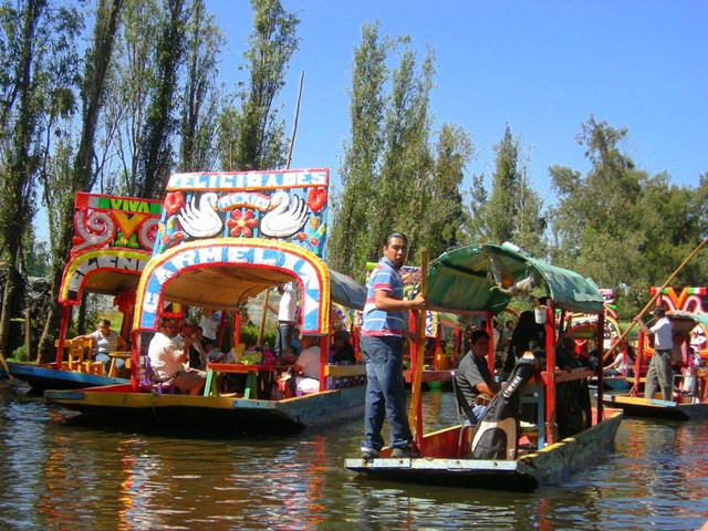 The boats at Xochimilco, Mexico, are often hired for birthday parties and family celebrations © Edythe Anstey Hanen, 2013