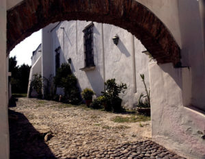 An arched passageway at Hacienda Labor de Rivera, a restored Mexico Hacienda in Jalisco that operates as a B&B. © John Pint, 2011