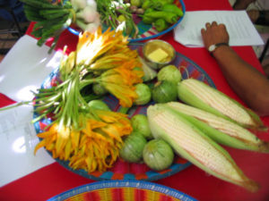 >Corn, squash blossoms and tomatillos, ingredients for the meal. Oaxaca cuisine is complex and delicious. © Alvin Starkman 2008