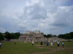 Visitors to Mexico explore the vast archeological site of Chichen Itza, one of the Seven Wonders of the Modern World. © Elisa Velazquez 2008.