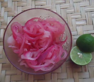 Red onions pickled in vinegar and bitter orange juice are a traditional condiment in the Yucatecan kitchen © Karen Hursh Graber 2013