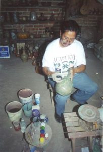 J. Ventura Hernández Benítez works on a ceramic pot in his workshop in Zinapécuaro