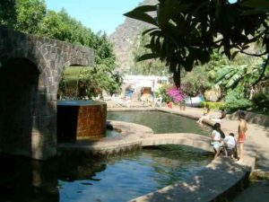 Halfway down the market tunnel to the church is an exit to the right where you find a series of fountains, pools, and aquaducts that provide a little botanical oasis and help to keep children occupied. It is rather a surprise to find this sudden copious supply of (spring) water in an area you had assumed to the semi-arid.