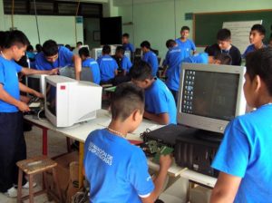 The boyt at Mexico's Villa de los Niños learn more than how to use computers. By the time they graduate they can take them apart and put them together again. © John Pint, 2012