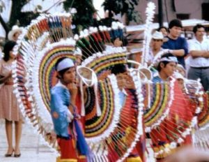 With a swirl of color, Quetzal dancers in Cuetzalan, Puebla perform to the sounds of flute and drum. © Tony Burton, 2004