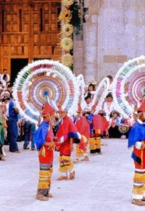 Quetzal Dance headdresses represent the extravagant colors of the quetzal bird, a sacred bird of the Maya. © Tony Burton, 2004