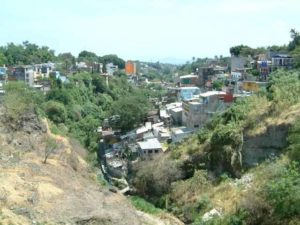 The look south into the ravine from the bridge. Apparently some have built in a flood area. Cuernavaca, Morelos © Rick Meyer 2006