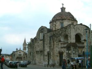 The view east down Hidalgo Street from across busy (main drag) Morelos Street. The Templo de la Tercera Orden and Capilla del Carmen beyond at first do not appear remarkable. Cuernavaca, Morelos © Rick Meyer 2006