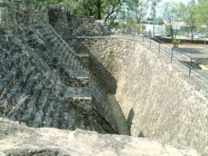 The main Teopanzolco Piramide was in the process of being built over when the Aztecs succumbed to Cortes. The fill was removed revealing the old structure. The front looking southwest. Cuernavaca, Morelos © Rick Meyer 2006