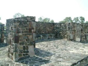 On the pyramid top looking south at the Tlaloc (rain god) temple. Four corner posts surround this temple. Cuernavaca, Morelos © Rick Meyer 2006