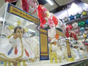 Candelaria, or Candlemas outfits for the image of the Christ child can be found in a variety of themes in this Oaxaca, Mexico, shop. This one depicts El Niño de la Misericordia, or the Child of Compassion. © Tara Lowry, 2014