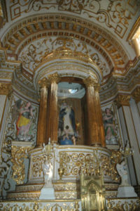The Capilla de Nápoles or Chapel of Naples is shaped like a cross with the walkway to the main altar almost twice as long as the two side aisles. All lead to statues enshrined by gold columns, alabaster white walls and a domed ceiling highlighted with gold filigree. The Sanctuary of Our Lady of Guadalupe in Zacatecas dates back to the early 1700s. © Jane Ammeson, 2009