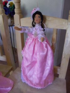 This charming handcrafted doll by Dolores Leycegui is a part of her collection based on the fashions of Mexico's Porfiriato © Alvin Starkman, 2012