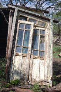 Doors, with a three-light transom found in the Mexico Lindo junkyard in Dolores Hidalgo © John Scherber, 2012