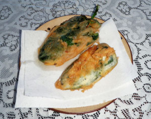 Drain chiles rellenos on paper towels. © Daniel Wheeler, 2010