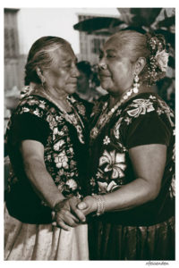 This portrait of women from Tehuantepec dancing together in a fiesta is by Xill Fessenden, who photographs Mexico's indigenous people. The photograph was exhibited in Chapala's annual Feria Maestros del Arte. © Marianne Carlson, 2008