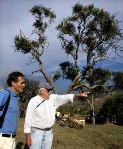 Archeologist Phil Weigand, right, describes the extraordinary size of El Palacio de Ocomo to Guadalajara muralist Jorge Monroy. Known as the Tecpan of Ocomo, it is the largest indigenous palace in Mesoamerica. © John Pint, 2009