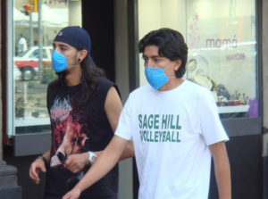 No one's "too cool for school" not to be wearing a mask. Mexico City residents take precautions to avoid catching swine flu. © Anthony Wright, 2009