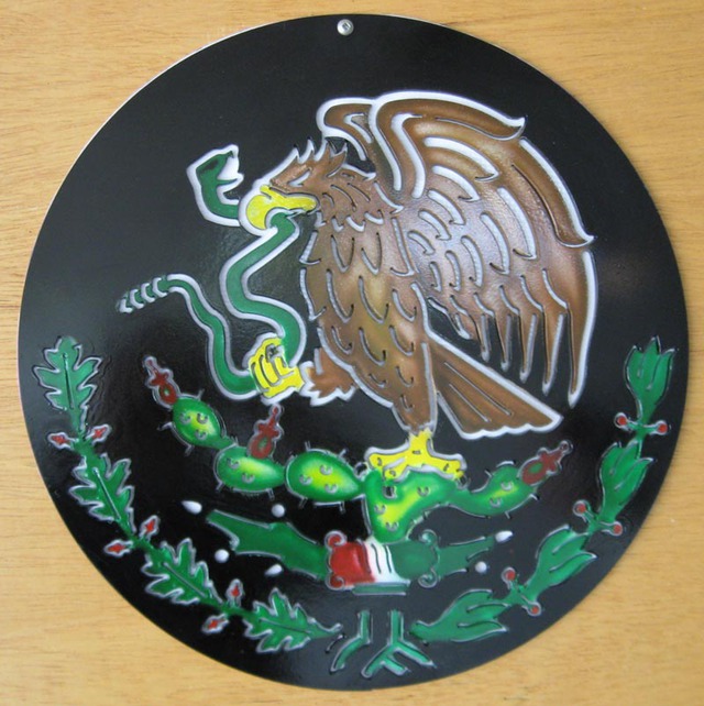 The national seal of Mexico cut of iron and painted by a local Chapala tattoo artist © Marvin West, 2013