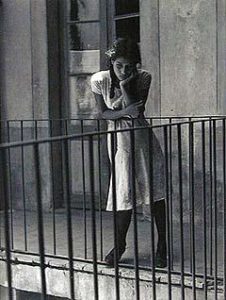 The Daydream (1935) Fantasy is a characteristic from his work of this period. In this photograph a young girl stands on a balcony caught in a wistful moment. Despite its simplicity, the picture has an ambiguous quality. Does it reflect longing, lament, or reverie? We are free to choose. In its quietude and sense of the solitary, it conveys a message across time and space.