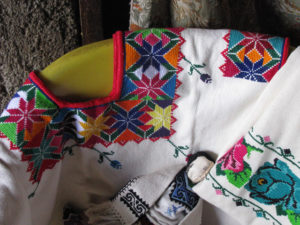 Colorful needlepoint images adorn the textiles of Hermelinda Reyes Ascencio and her family. Embroidery is one of Mexico's traditional arts. © Travis Whitehead, 2009