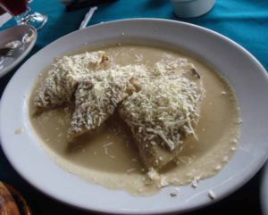 Dobladas de cacahuate, a kind of folded-over tortilla covered with a velvety peanut sauce, are a specialty of the mountain region of Veracruz. Dishes containing peanuts are found all over the state of Veracruz, a reflection of the Afro-Caribbean influence on the cuisine. © Karen Hursh Graber, 2014