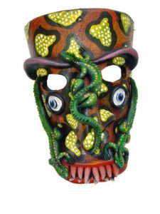 Ceramicist and mask artisan Prudencio Guzman names this mask "Tlatuani II,"a variation of Nahuatl word Tlatoani, which means "lord or spokesperson." The fearsome Tastoanes battle Saint James in a ritual dance each year on July 25th. © Kinich Ramirez, 2006
