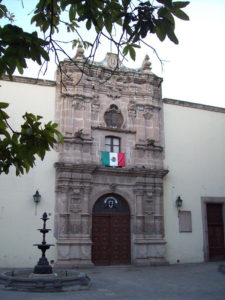 An extravagant quarry stone archway surrounds the main entrance of the Universidad Juarez del Estado. Capital of the Mexican state of the same name, Durango housed one of the most important educational entities in northern New Spain's New Vizcaya Province. © Jeffrey R. Bacon, 2009