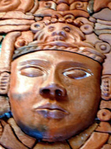 This tranquil face distinguishes the infinity figure in 'Eternity Mask,' a terracotta relief mural by Mexican artist Efren Gonzalez © Rob Mohr, 2010