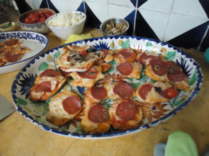 Individual pizzas are creatively shaped and lovingly made by young students at Chef Pilar Cabrera's Casa de los Sabores cooking school in Oaxaca. © Alvin Starkman, 2011