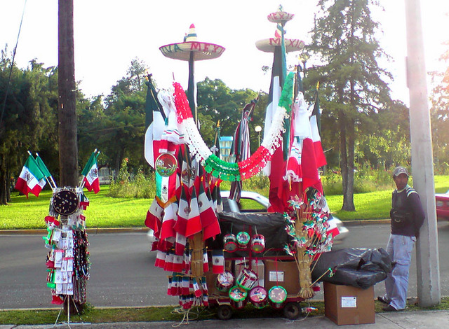 A streetside stand selling flags and toys with patriotic themes in a Guadalajara suburb. They can be seen from mid August up to Mexico's Independence Day, September 16. © Daniel Wheeler, 2009