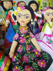 This handcrafted Frida Kahlo doll wears a traditional Mexican dress covered with flowers, embroidered by hand © Alvin Starkman, 2012