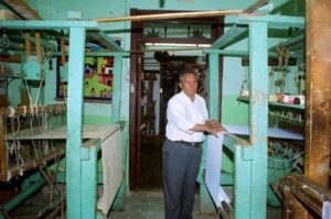 Salvador Medina explains how the looms at the sarape factor have been used to create masterpieces. One sarape takes a week to a week and a half to create.