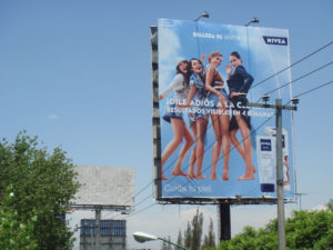 Thousands of billboards - many of them erected illegally - submit worthy contributions to the bleak aesthetics of Mexico city. © Anthony Wright, 2009