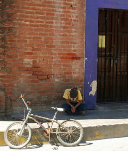 Boy and bike on a side street in Alamos. He was too shy to look at the camera. © Gerry Soroka, 2009