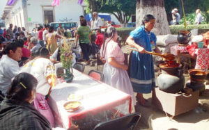 Busy cooks participating in the Purepecha Food Show serve endless plates of tasty indigenous dishes.