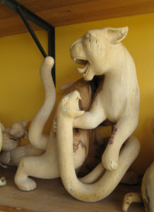 A carved cat and snake struggle in mortal combat. Oaxaca's Jacobo Angeles is a master of Mexican folk art. © Alvin Starkman 2008
