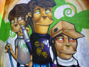 Self portrait of graffiti artists as young men from one of the graffiti murals at Mexico City's Estadio Azteca (Aztec Stadium). © Anthony Wright, 2009