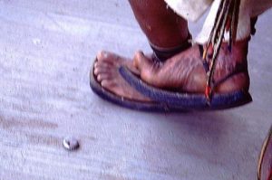 The Taramuhara Indians of Mexico known for their skill and endurance in running. They climb these rocky trails of the rugged Copper Canyon wearing sandals with soles made from rubber tires, fastened with a few pieces of leather. © Geri Anderson 2001.