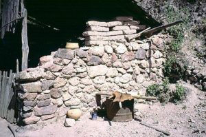 A shy people, unaccustomed to visitors, the Tarahumara residing here were out of sight upon my arrival. My guide had warned them with shouts of AHOOOO and WHOOOO. I felt like an unwelcome intruder, because I was. © Geri Anderson 2001.