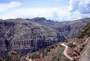 The 100-mile road which winds from Creel, elevation 7,500 feet, to Batopilas, 1,650 feet, is narrow and — at points — treacherous, especially in the last 30 or so miles. This part of Mexico's Copper Canyon is remote and rugged. © Geri Anderson 2001.