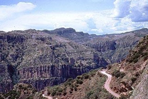 The 100-mile road which winds from Creel, elevation 7,500 feet, to Batopilas, 1,650 feet, is narrow and — at points — treacherous, especially in the last 30 or so miles. This part of Mexico's Copper Canyon is remote and rugged. © Geri Anderson 2001.