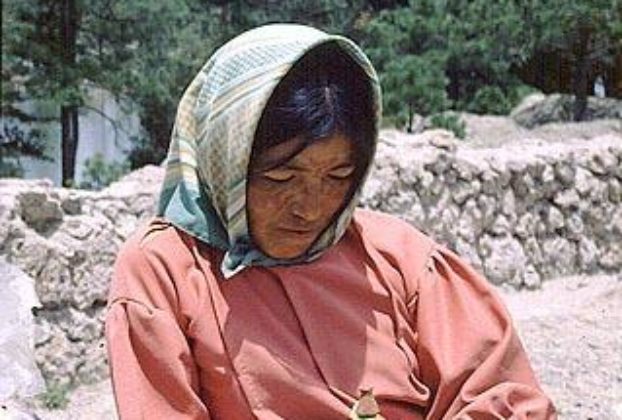 With tourism increasing, the Taramuhara women of the Copper Canyon make dolls and sell them to tourists at train stops. © Geri Anderson 2001.