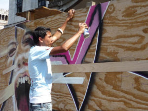 A young graffiti artist at work on a recent project surrounding the Palacio de Bellas Artes in the Centro Historico of Mexico City. © Anthony Wright, 2009