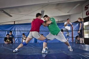 Aspiring Mexican wrestlers David and Roberto lock horns at Mexico City's Star Gym © Annick Donkers, 2012