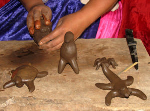 Antonia Cruz Rafael's clay creepy-crawlies lay sprawled across the work table in her home. Ocumicho, a town in western Michoacan, is known for its ceramic crafts. © Travis Whitehead, 2009