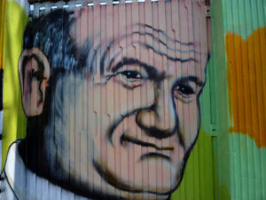 Pope John Paul II remembered in a graffiti portrait. Actually, the outside walls of the Estadio Azteca (Aztec Stadium) had already been decorated in legitimate graffiti mural art for some years, but a makeover was decided upon to inject some fresh artistic blood. © Anthony Wright, 2009