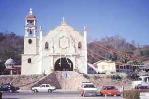 Like many Mexican towns, the main square in La Crucecita is anchored by a church.